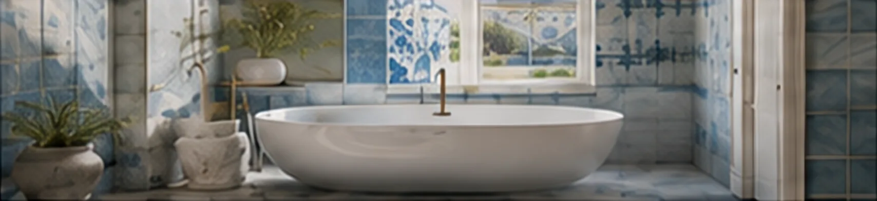 Bathroom with a freestanding bath surrounded by soft blue hand-painted Portuguese wall tiles